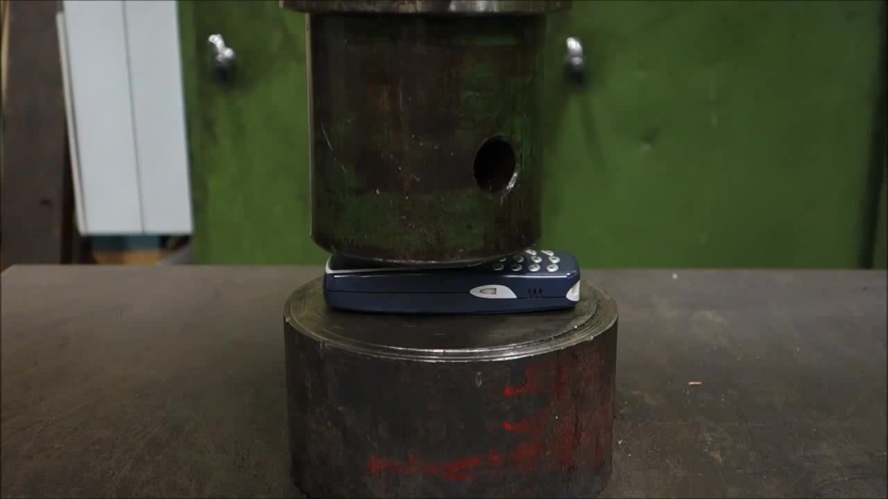 Crushing Nokia 3310 with hydraulic press Coub The Biggest Video