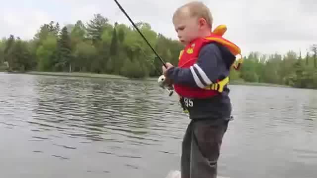 FUNNY VIDEOS KIDS FUNNY BOY FISHING CATCHES HIS FIRST FISH